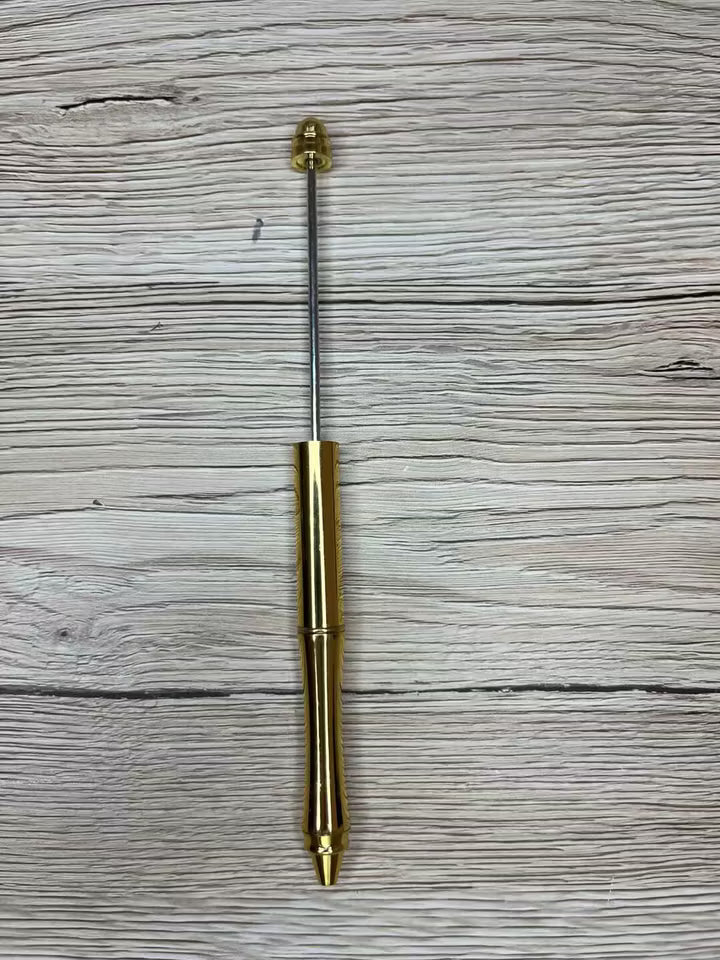 Penna att pärla på Guld