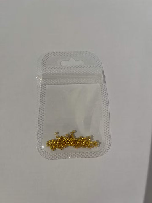 Guldfärgade Klämpärlor 2mm (100st)