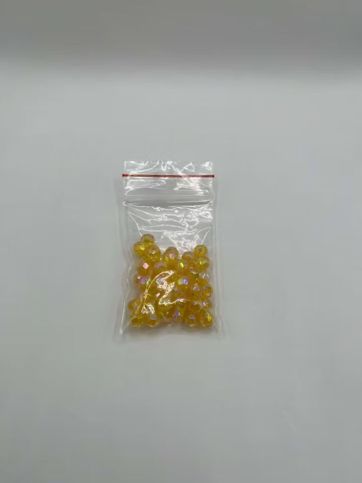 Akrylpärla facetterad gul 6 mm (50st)
