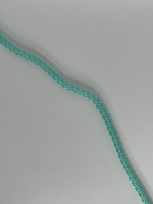 Sträng med turkosa glaspärlor, 6mm