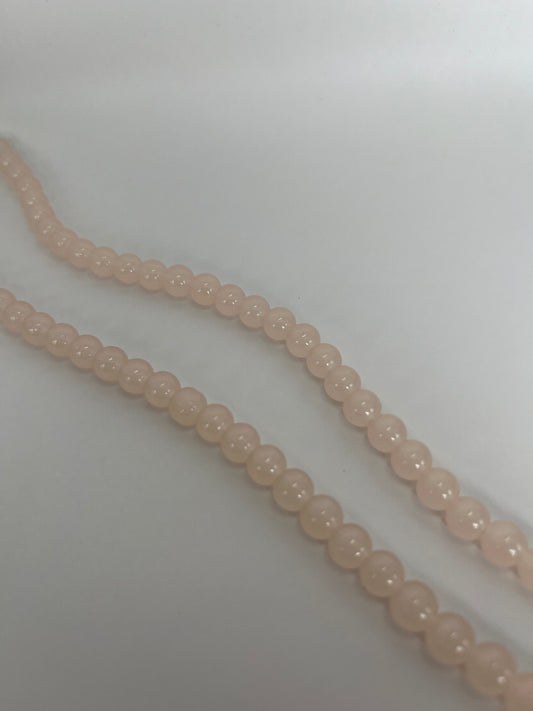 Sträng med ljusrosa glaspärlor, 8mm
