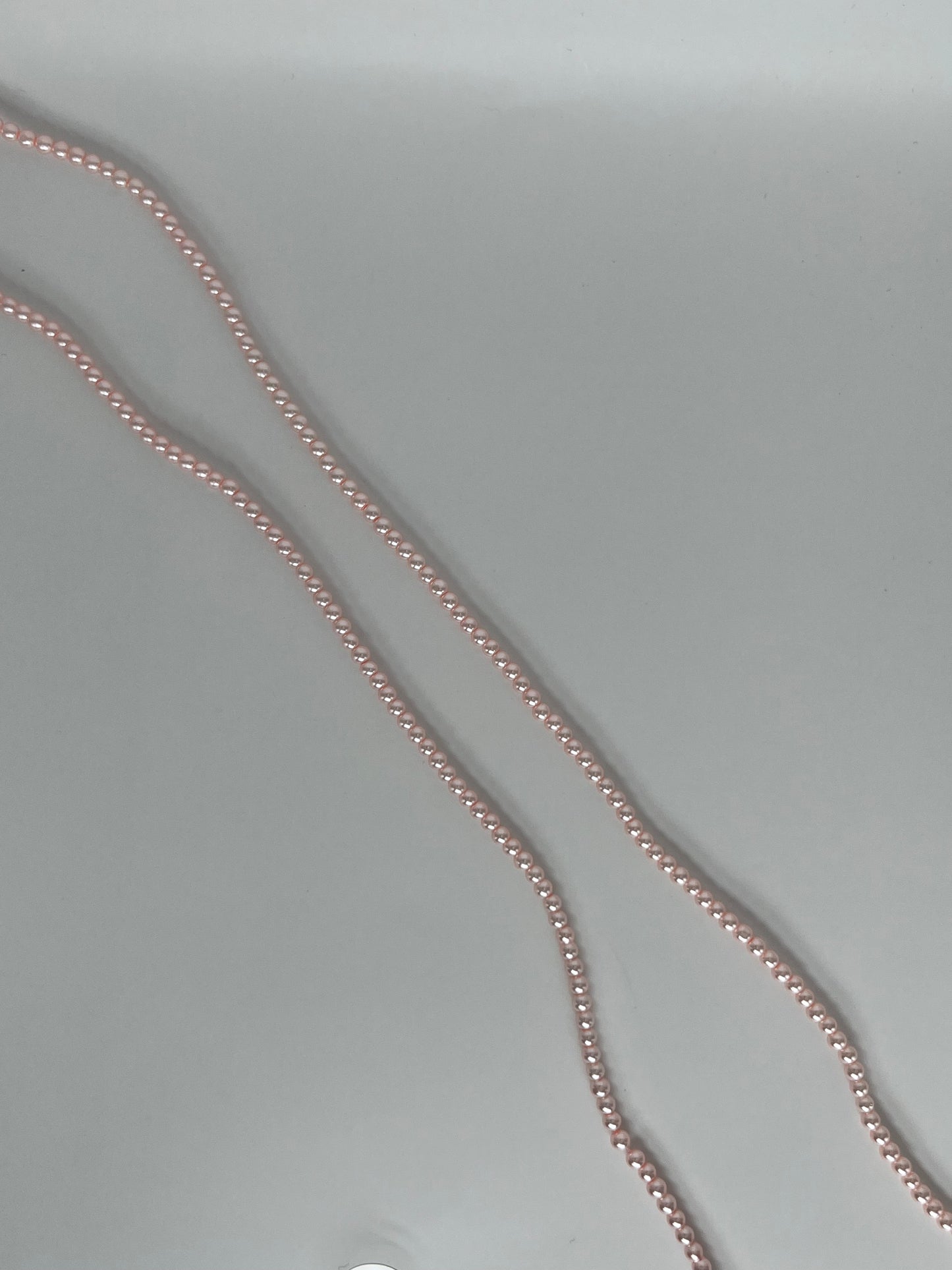 Sträng med vaxade glaspärlor ljusrosa, 3mm