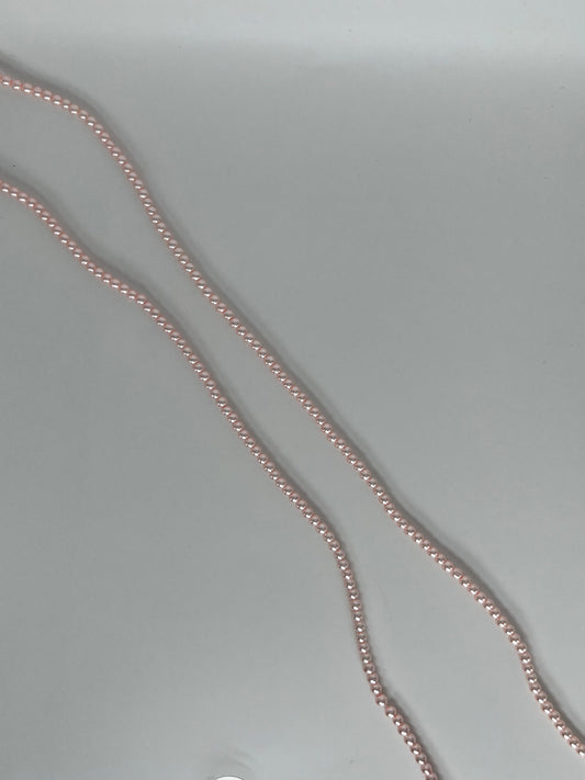 Sträng med vaxade glaspärlor ljusrosa, 3mm