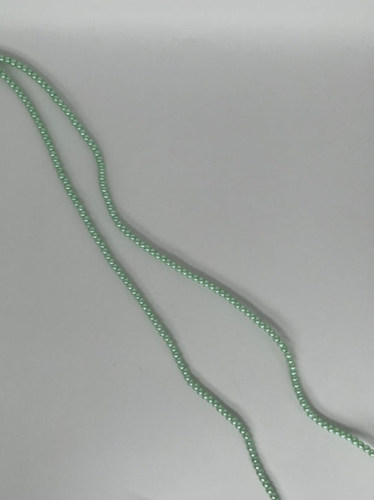 Sträng med vaxade glaspärlor ljusgrön, 3mm